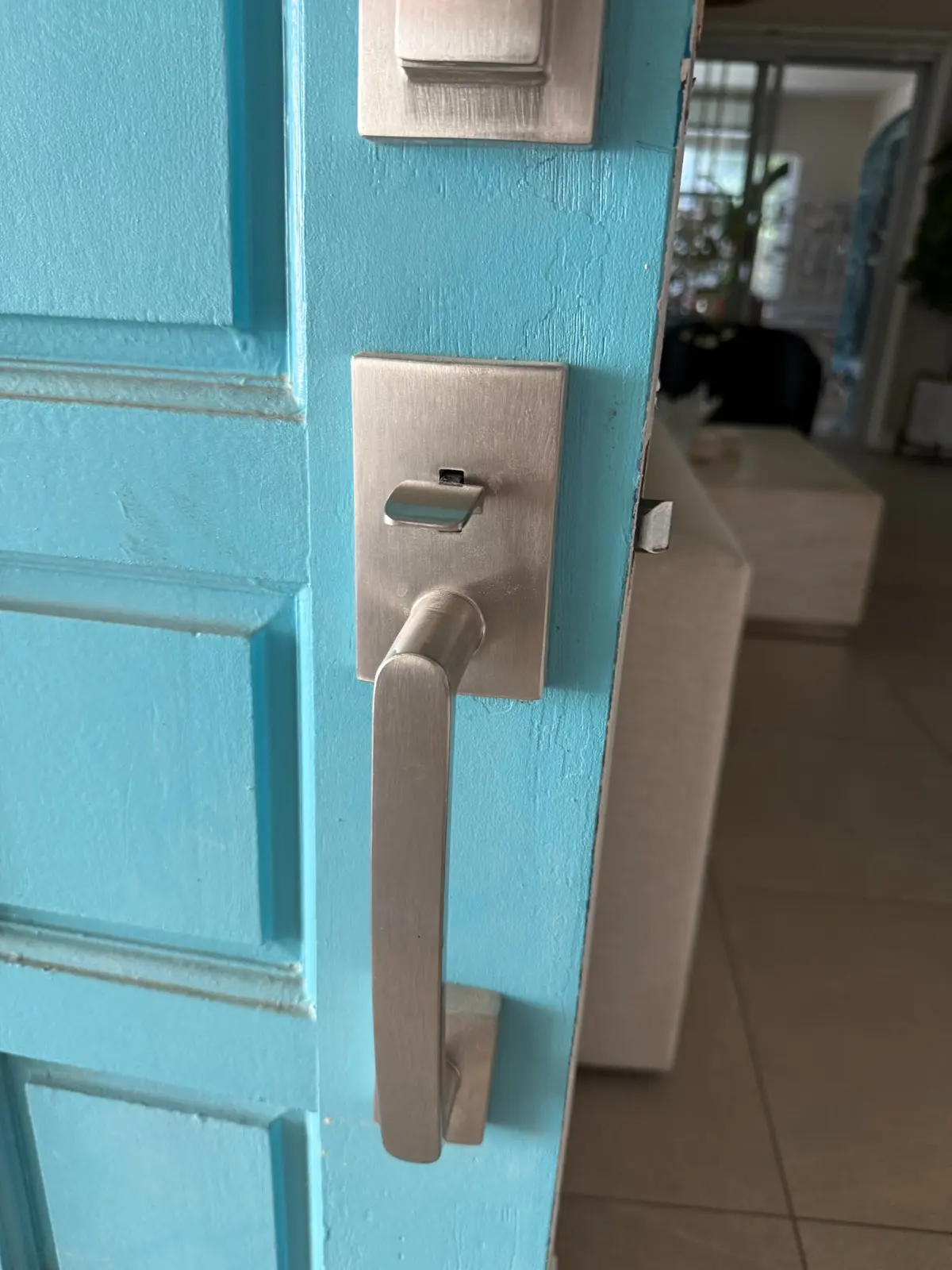 New modern front door handle and lock hardware installed by G&P Property Solutions LLC