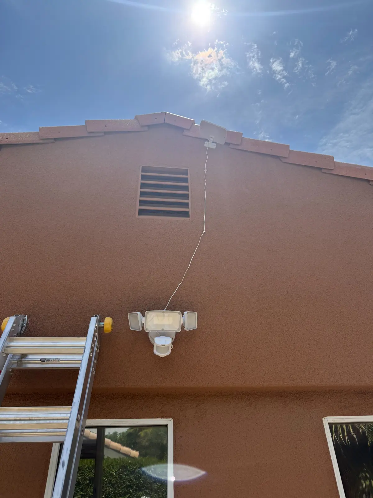 Outdoor camera and motion light installation by G&P Property Solutions LLC
